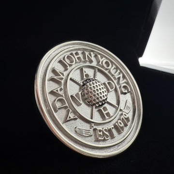 Close Up picture of a custom made sterling silver pendant on a black background